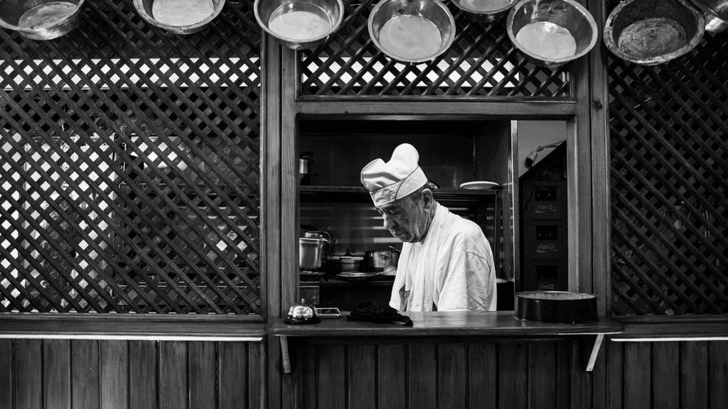 Chef Daniel Shin at the pass of his restaurant during service
